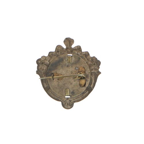 Broche medallón ovalado