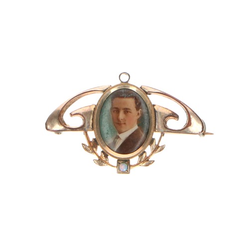 Broche-colgante con diseño de galería calada