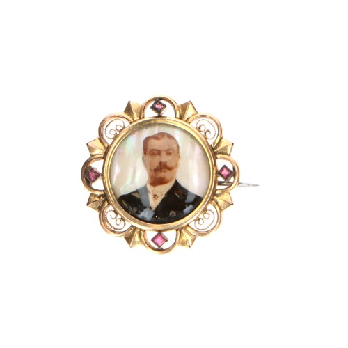 Broche de galería o medallón de solapa