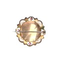 Broche de galería o medallón de solapa