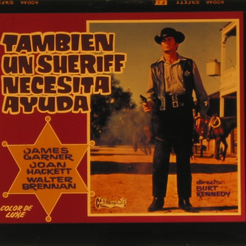 Placa de cine para proyección del film 'También un sheriff necesita ayuda' (1969)