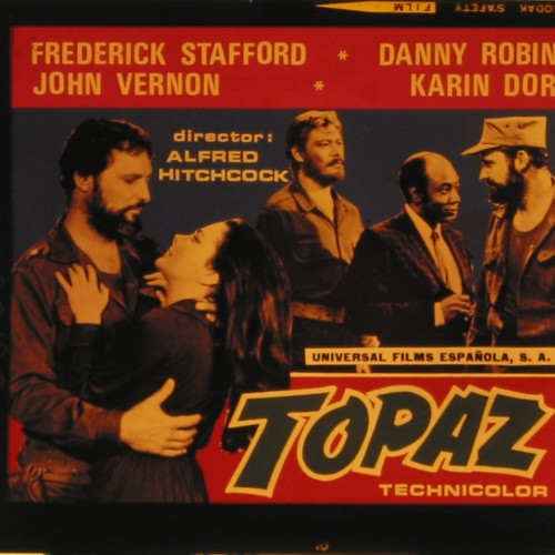 Placa de cristal para proyección en cines con anuncio de la película "Topaz" (1969) de Alfred Hitchcock.