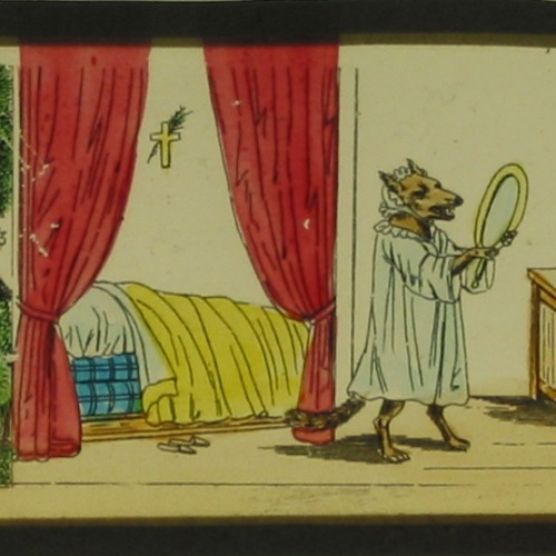 Placa de Linterna Mágica en formato panorámico, que narra escenas del cuento de Caperucita Roja ('Le petit Chaperon rouge').