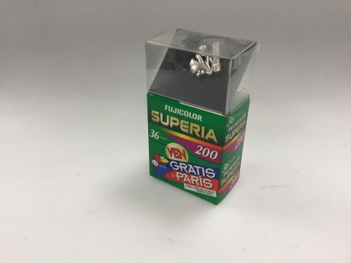 Film box with silver world football pin