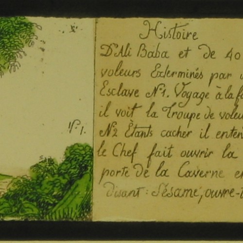 Placa de cristal para Linterna Mágica, tira con dos escenas y texto del cuento "Alí Babá y los cuarenta ladrones"
