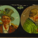 Placa de linterna mágica con cuatro caricaturas de personajes populares masculinos.