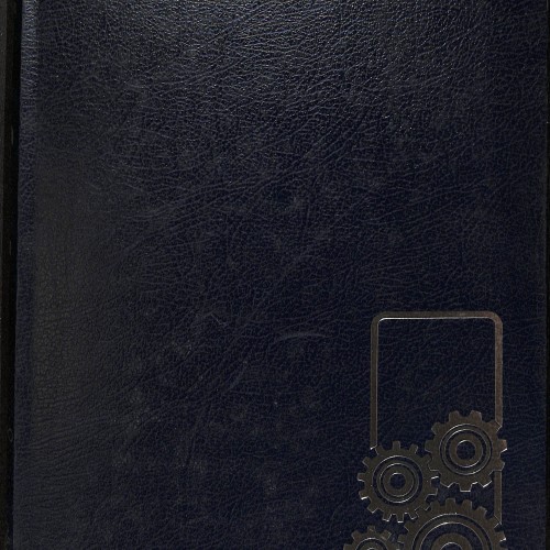 Volumen de enciclopedia 'Cómo funciona' (posiblemente volumen 2), encuadernación en símil piel.
