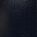 Volumen de enciclopedia con cubierta de símil piel y diseño de engranajes