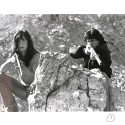 Fotografía original de rodaje con dos personajes armados