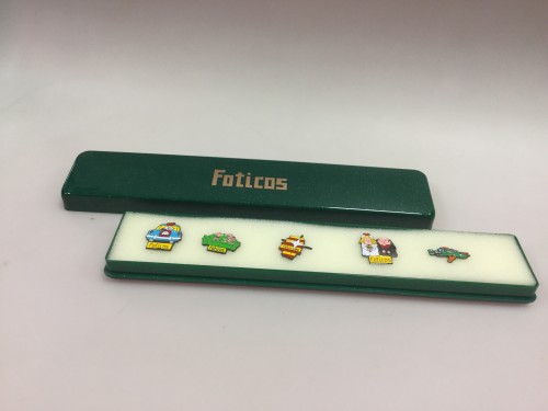 Foticos broches merchandising