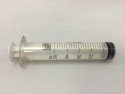 Plastic syringe