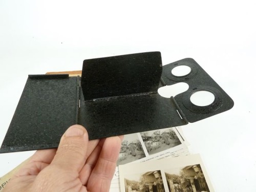 Metal folding stereo viewer overlooking cardboard Camerascope