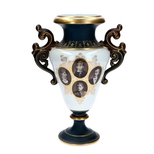 Vase in the style of an amphora with eight portrait photographs