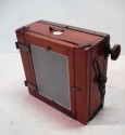 Wooden box with wooden travel camera and set revealed