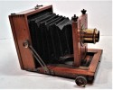 Wooden box with wooden travel camera and set revealed